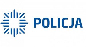 Na białym tle, niebieski znak z lewej strony, obok napis policja.